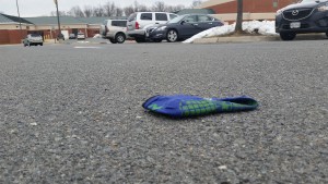 random sock in school parking lot